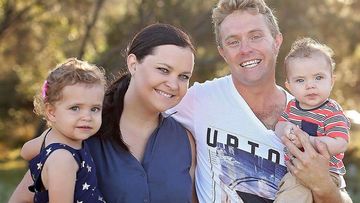 Andy Forbes with his wife Sam and their two children. (Supplied)