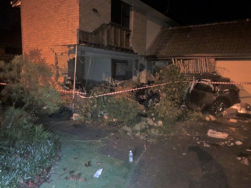 A portion of the Sunnybank Hills house was destroyed after the stolen vehicle crashed into it.
