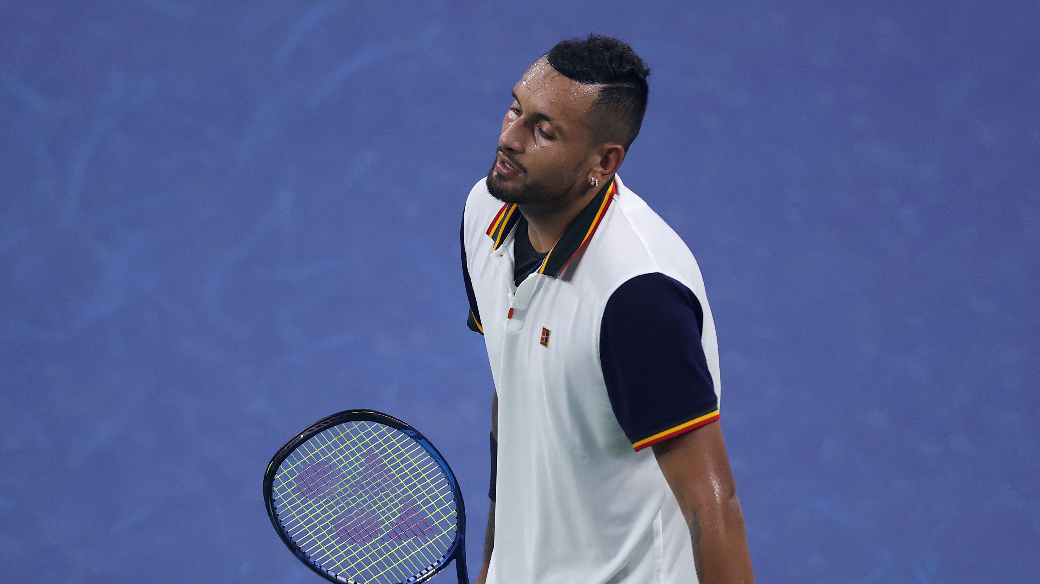 Nick Kyrgios reacts after losing a point against Roberto Bautista Agut. 