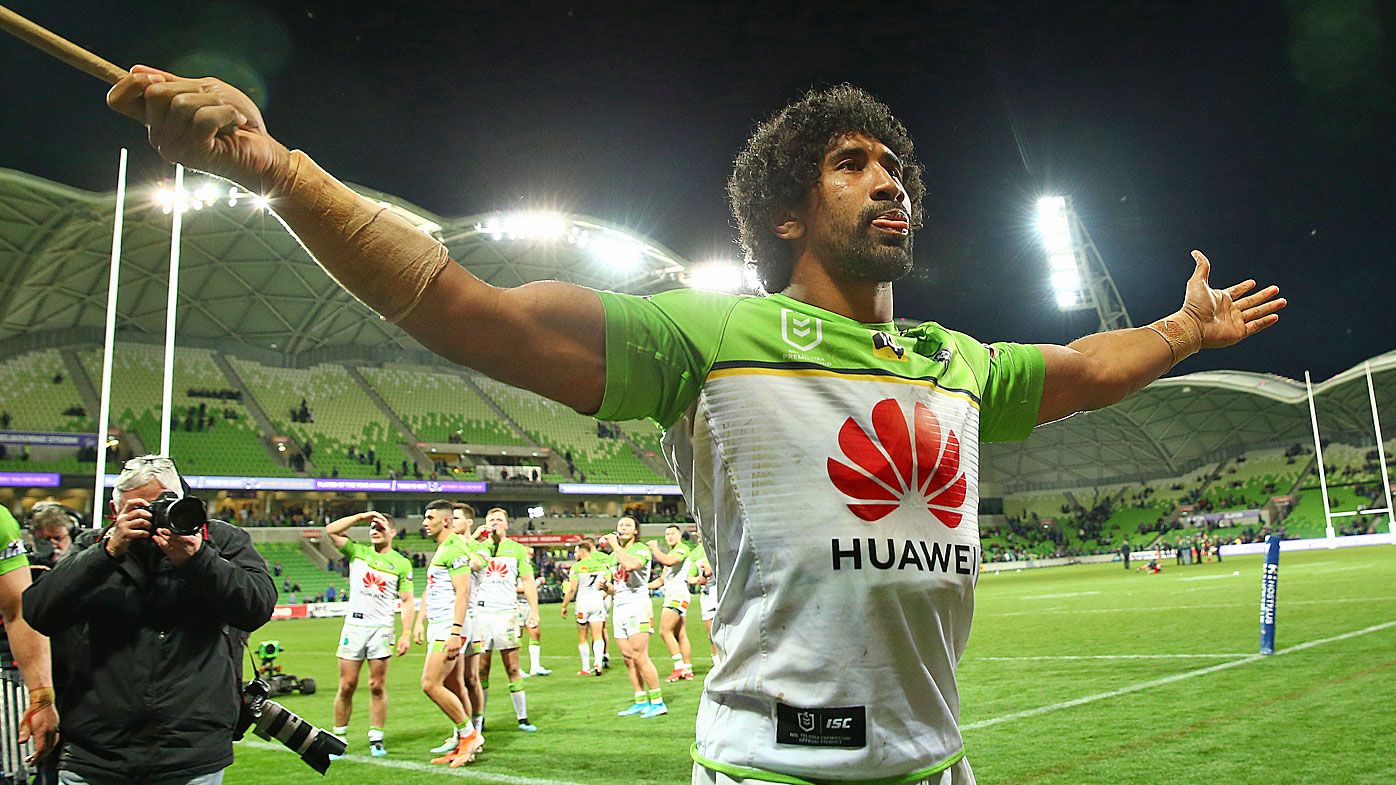 The Raiders celebrate defeating Melbourne Storm