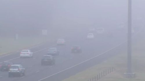 Drivers were forced to switch on headlights for the very foggy morning commute. (9NEWS)