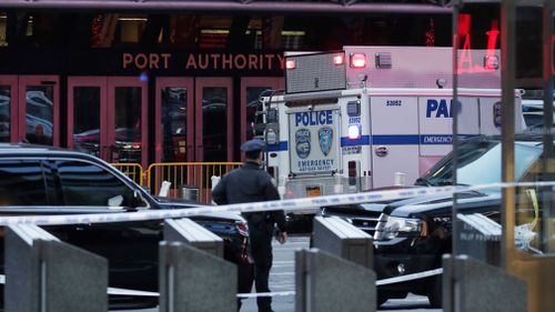 Police guard the Port Authority station. (AAP)
