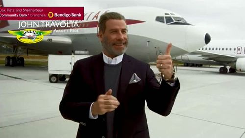 Travolta in front of the Boeing 707 he will be donating.