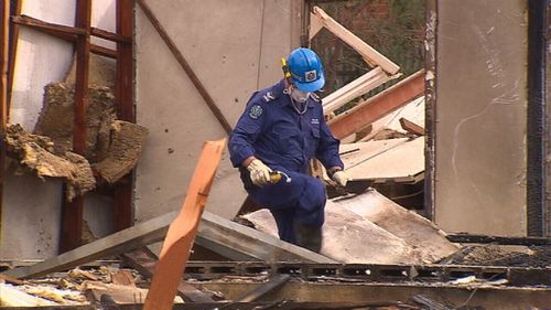 The explosion damaged a number of surrounding houses. (9NEWS)