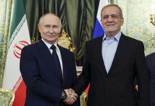 Russian President Vladimir Putin  and Iranian President Masoud Pezeshkian 