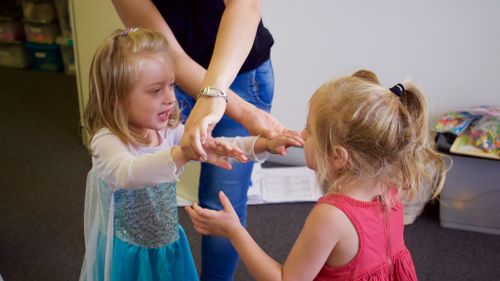 The twins are being taught how to physically interact with each other. (Ehsan Knopf/9NEWS)