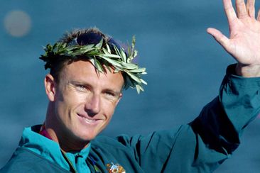 An August 28, 2004 file photo of Australian Nathan Baggaley celebrating after receiving a silver medal in the K1 500 mens event at the 2004 Olympic Games in Athens. (AAP)