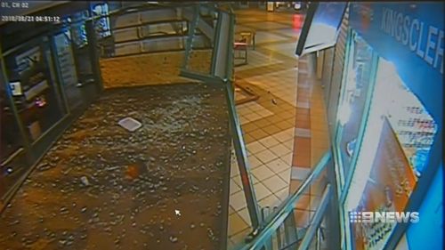 Before 5am, two men smashed a truck into the Keysborough centre before it became wedged next to a lotto newsagent.