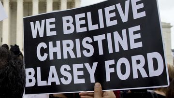 Protesters demonstrate in opposition to Brett Kavanaugh's nomination by supporting his alleged attempted rape victim Christine Blasey Ford.