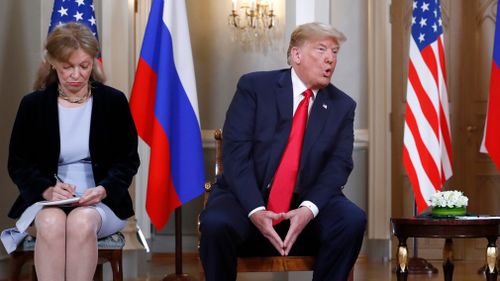 Mr Trump has complained some people "HATE" the fact that he "got along well" with Russian President Vladimir Putin, preferring to "go to war than see this". Image: AP