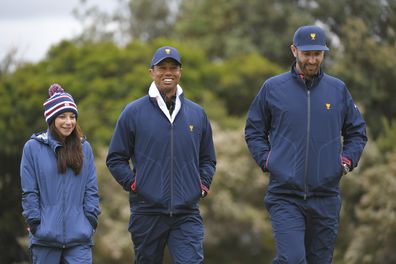 Erica Herman and Tiger Woods during the third round at the Presidents Cup at The Royal Melbourne Golf Club on December 14, 2019, in Victoria , Australia.