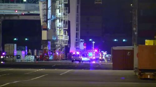 Exclusion zone in place as fire crews work to clean-up chemical spill at Port Melbourne docks