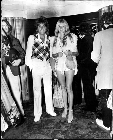 Rod and Dee Enjoys Beatles ***** Gravel- voiced Rod Stewart and Dee Harrington - wearing hot pants to emphasise the evening of Beatles nostalgia - arrive at the Lyric Theatre, London.   London swung briefly again at the first night at the Lyric Theatre of the musical John, Paul, George, Ringo... a cavalcade of the rise and demise of Beatlemania. It was a night of nostalgia for many stars of stage and screen, including Peter Sellers. Rod Stewart - one of the world's richest pop stars was there wi