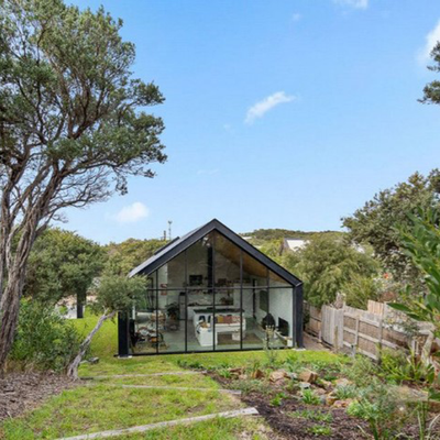 Australia’s ‘glass house’ for sale blends in with its natural surroundings