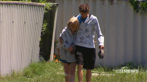 The young couple had to breakdown the backdoor to escape. (9NEWS)