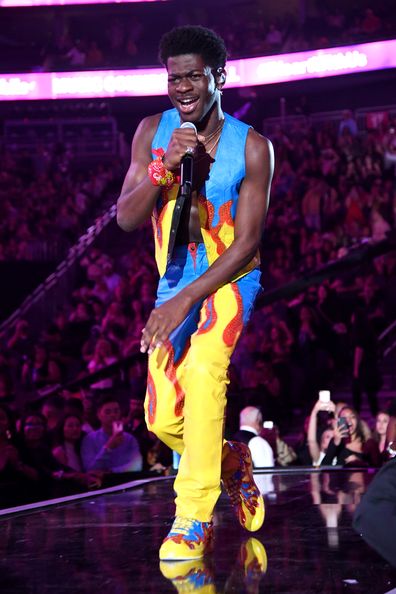 Lil Nas X, performs, on stage, singing, iHeartRadio Music Festival