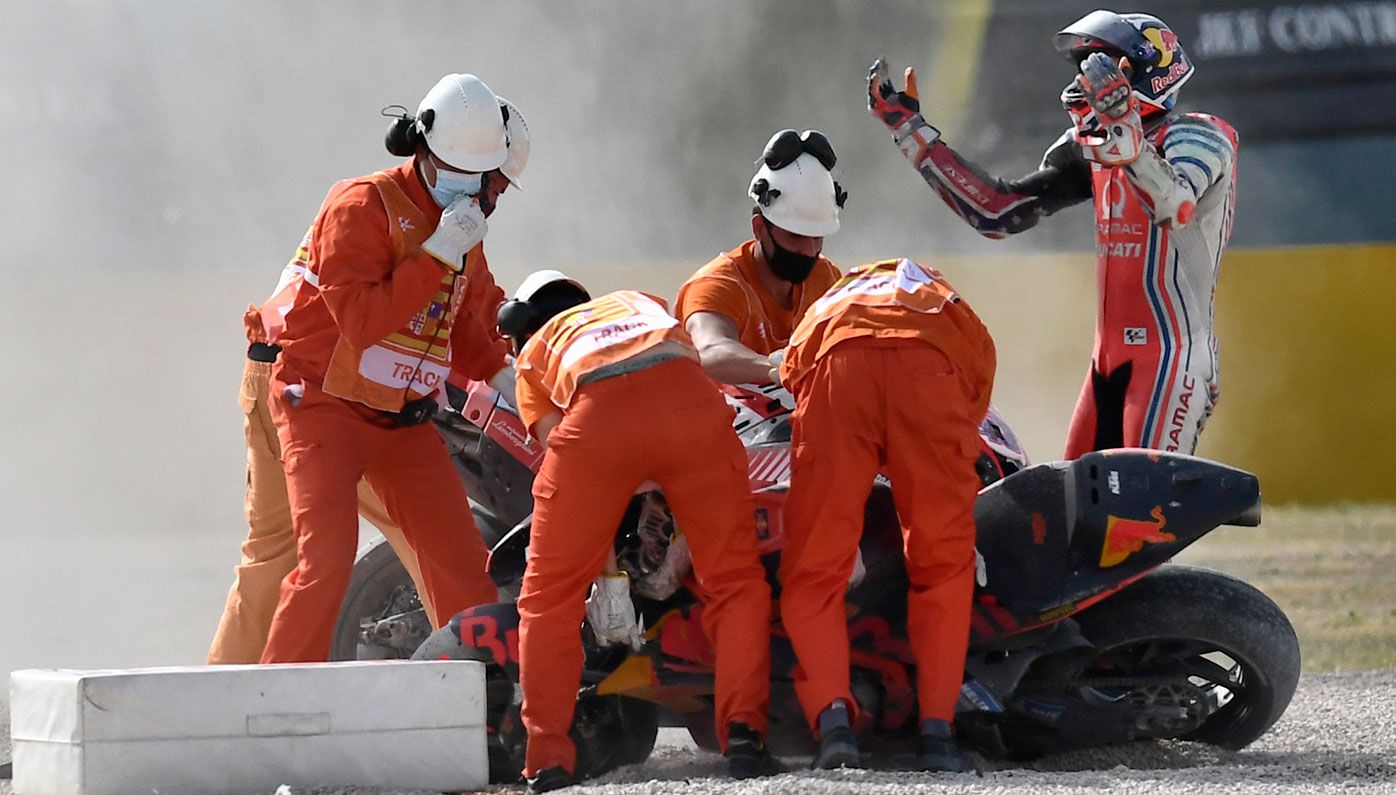 Jack Miller holds his hands after crashing in the MotoGP race during the Motorcycle Grand Prix of Teruel in Alcaniz, Spain.