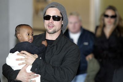 ... that is, before brooding Brad swoops in to legally adopt both Maddox and Zahara! <br/><br/>Welcome Jolie-Pitt clan...<br/><br/>Source: Getty