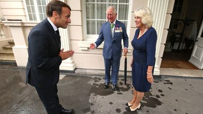 Prince Charles, Prince of Wales and Camilla, Duchess of Cornwall greet French President Emmanuel Macron with a namaste gesture as he arrives at Clarence House on June 18, 2020 in London, England