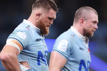 Lachlan Swinton of the Waratahs looks dejected after the final Rebels try during the round six Super Rugby Pacific match between NSW Waratahs and Melbourne Rebels.