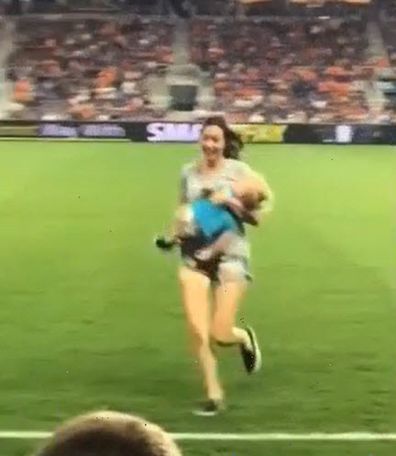 Mom rescues 2-yr-old who ran onto field at pro soccer game - Upworthy