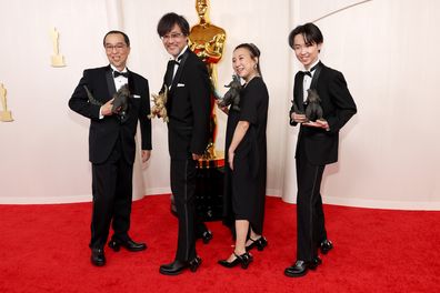 Masaki Takahashi, Takashi Yamazaki, Kiyoko Shibuya, and Tatsuji Nojima attend the 96th Annual Academy Awards on March 10, 2024 in Hollywood, California. 