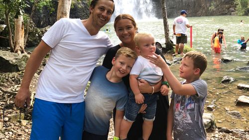 Josh Thew (far right) pictured before his diagnosis, with parents Hannah and Rob, and brothers Charlie (centre left) and Harvey. 