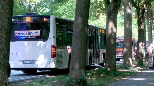 A bus stands on a street in Luebeck, northern Germany, after a man attacked people inside. (AAP)