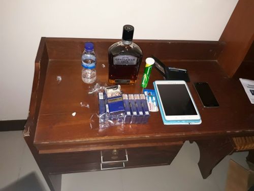 These items were found on the table inside Clinton Dally's hotel room. (Supplied)