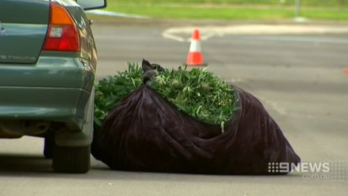 A large bag of drugs was dumped by one of the men who fled. (9NEWS)