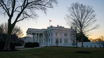 The White House is seen at sunrise in Washington, DC, in January 2021.