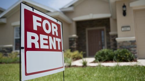 For Rent sign in front of new house