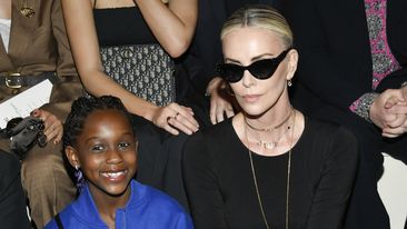 Charlize Theron, right, and daughter August attend the Dior pre-fall 2024 fashion show at the Brooklyn Museum on Monday, April 15, 2024, in New York. (Photo by Evan Agostini/Invision/AP)