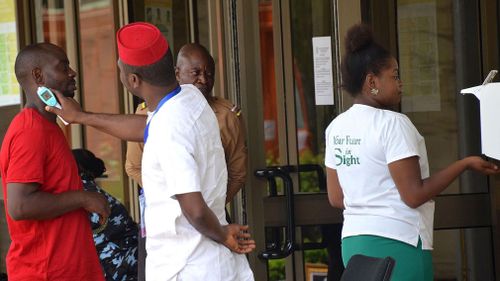 Visitors are screened for the Ebola virus at the Economic Community of West African States (ECOWAS) Parliament secretariat in Nigeria. Picture: EPA