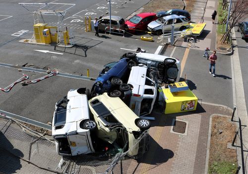 A view of tumbled cars following strong winds caused by powerful typhoon Jebi, in Osaka, Osaka Prefecture, western Japan