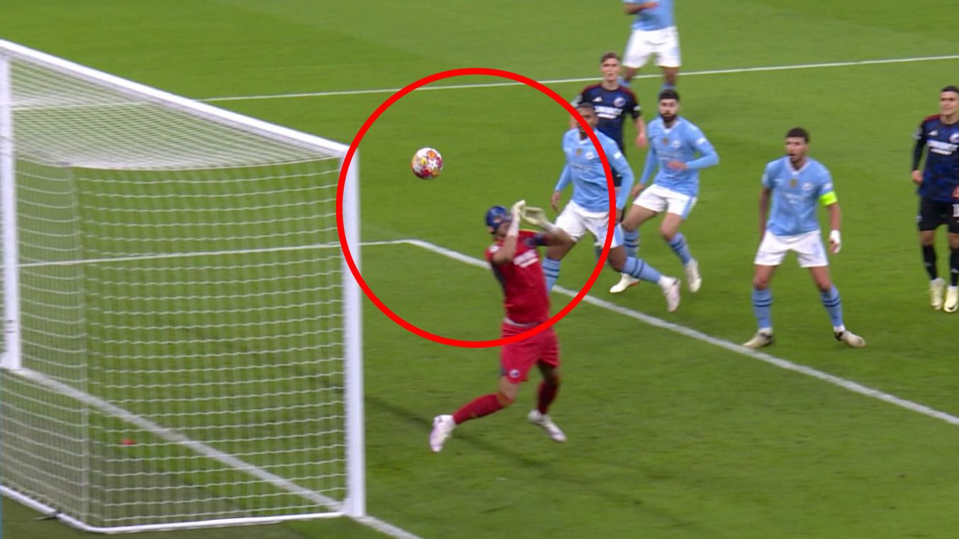 Copenhagen goalkeeper Kamil Grabara lets the ball slip through his hands into the goal.