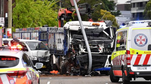 The truck veered into northbound lanes, hitting pedestrians, a power pole, a bus stop and a building.