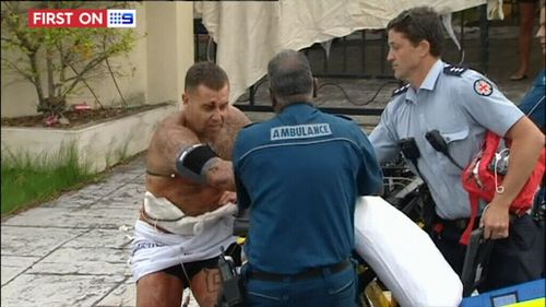 The man was being treated after he was stabbed in Broadbeach Waters. (9NEWS)