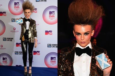 R&B singer Tallia Storm really wants to show us her crystal encrusted Scottish flag case. Ok, we got it.