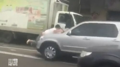 This road rage incident saw someone end up on the bonnet of the car.