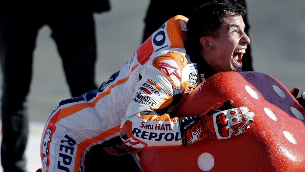 Marc Marquez wins fourth MotoGP championship after third-placed finish in Valencia