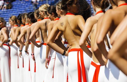 Scantily-clad women line the track at the Monaco GP last year. (AAP)
