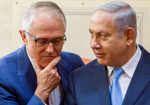 Former Australian Prime Minister Malcolm Turnbull and Israeli Prime Minister Benjamin Netanyahu chat at the opening of an ANZAC museum in the memorial for the fallen in the Battle of Beersheba during a ceremony marking the 100th anniversary of the battle