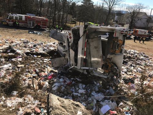 The smash left rubbish from the truck strewn around the track. (AAP)