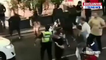 Police were able to stop the violent brawl on a busy Adelaide street by using capsicum spray on the alleged offenders.