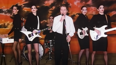 Robert Palmer and his dancers in the &#x27;Addicted to Love&#x27; music video.