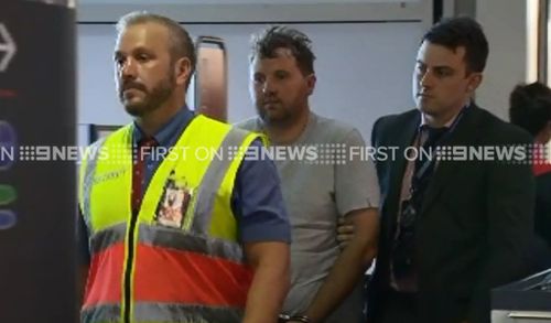 Jason Greatbach has been extradited to Queensland over an alleged stabbing. (9NEWS)