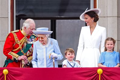 (L-R)  Prince Charles, Prince of Wales, Queen Elizabeth II, Prince Louis of Cambridge, Catherine, Duchess of Cambridge and Princess Charlotte of Cambridge watch the RAF flypast on the balcony of Buckingham Palace during the Trooping the Colour parade on June 02, 2022 in London, England. The Platinum Jubilee of Elizabeth II is being celebrated from June 2 to June 5, 2022, in the UK and Commonwealth to mark the 70th anniversary of the accession of Queen Elizabeth II on 