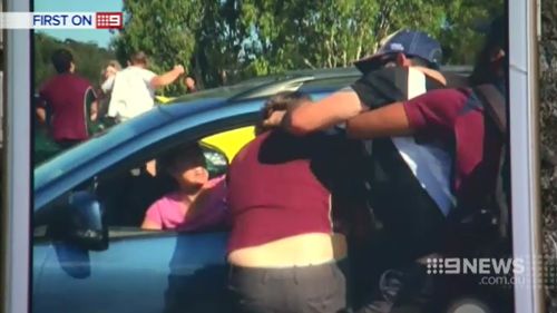 Spot brawls broke out in the carpark. (9NEWS)