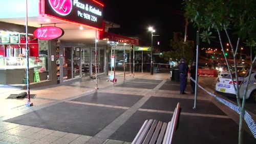 The man was standing with a group of people on the footpath when the attack occurred. (9NEWS)